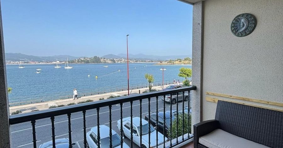 Precioso apartamento con vistas al mar a pie de playa: Foto