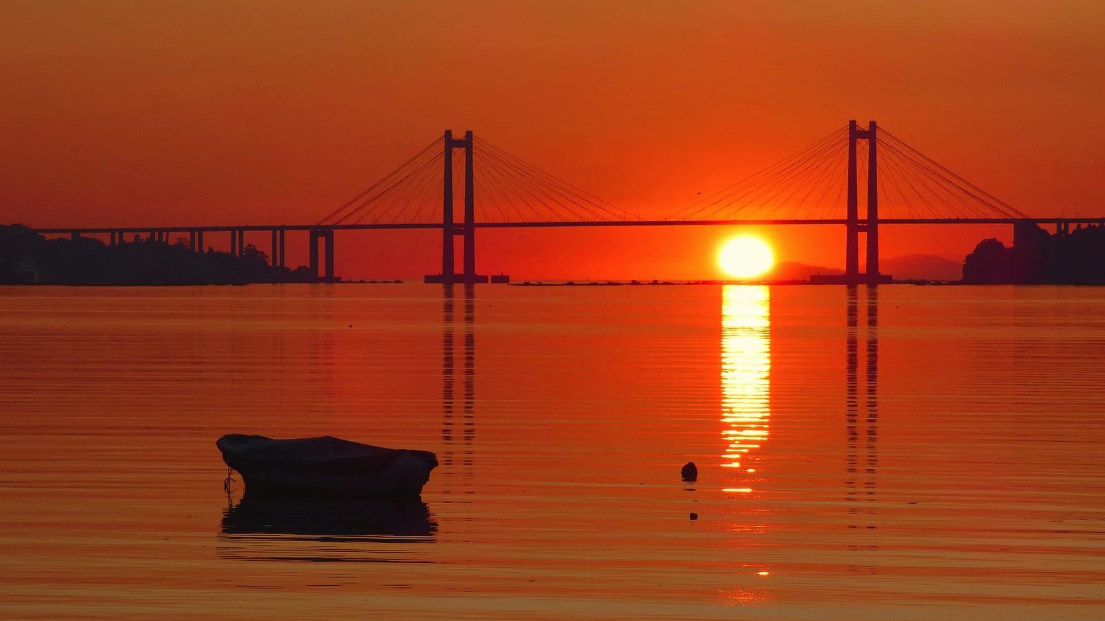 Solpor tras a ponte de Rande desde Cesantes, Redondela